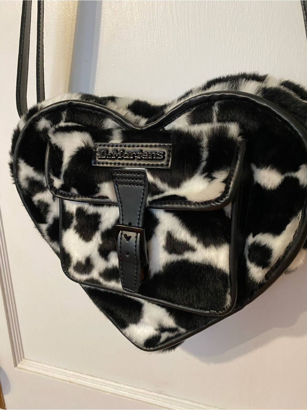 Dr. Martens Black & White Cow Print Faux Fur Heart Crossbody Backpack